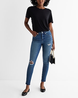 Mid Rise Medium Wash Ripped Skinny Jeans