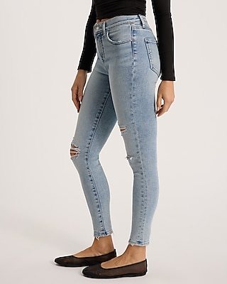 Mid Rise Light Wash Ripped Hyper Sculpt Skinny Jeans