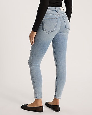 Mid Rise Light Wash Ripped Hyper Sculpt Skinny Jeans