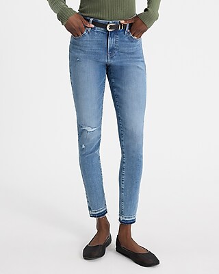 Mid Rise Light Wash FlexX Ripped Raw Hem Skinny Jeans