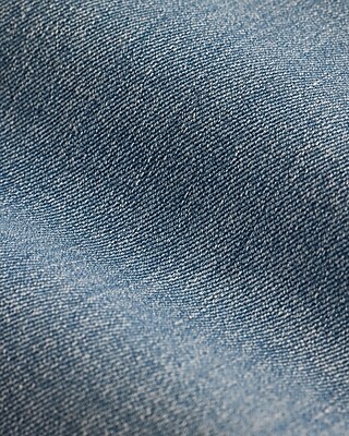 Mid Rise Light Wash Studded Skinny Jeans