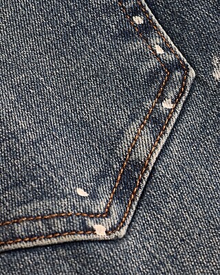 Mid Rise Medium Wash Paint Splatter Skinny Jeans