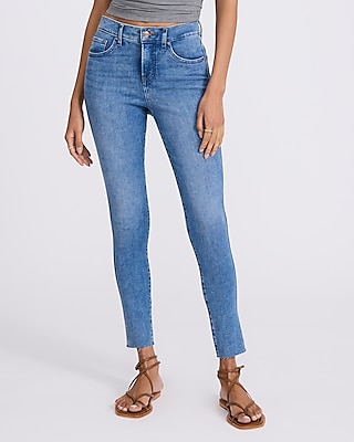 Mid Rise Medium Wash Raw Hem Skinny Jeans