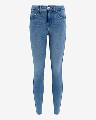 Mid Rise Medium Wash Raw Hem Skinny Jeans