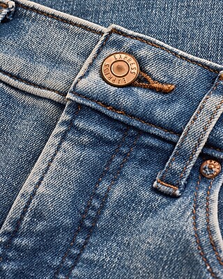 Mid Rise Medium Wash Raw Hem Skinny Jeans