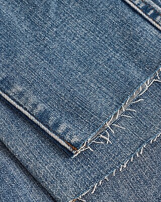 Mid Rise Medium Wash Raw Hem Skinny Jeans