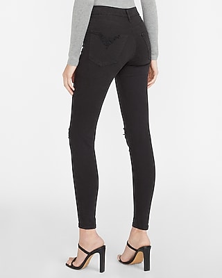 mid rise black ripped skinny jeans