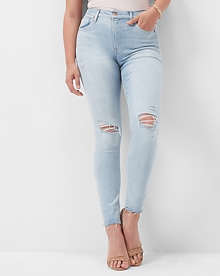 Mid Rise Light Wash Ripped Raw Hem Skinny Jeans