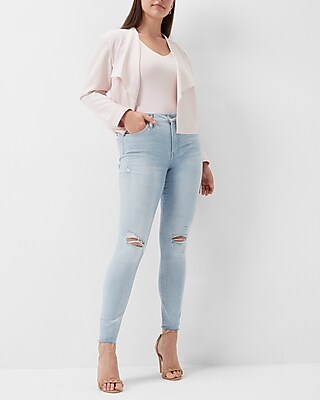 Mid Rise Light Wash Ripped Raw Hem Skinny Jeans