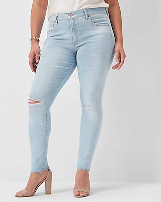 Mid Rise Light Wash Ripped Raw Hem Skinny Jeans