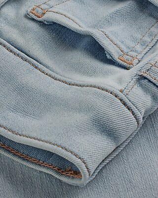 Super High Waisted Light Wash Raw Hem '90s Slim Jeans
