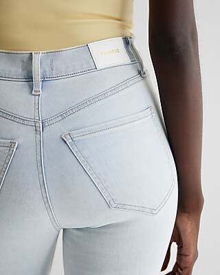 Super High Waisted Light Wash Raw Hem '90s Slim Jeans