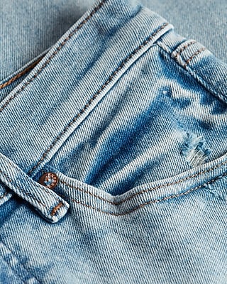 Mid Rise Light Wash Ripped Cropped Skinny Jeans