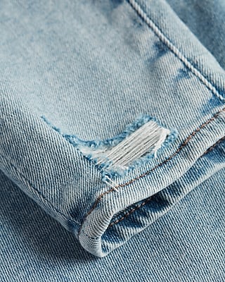 Mid Rise Light Wash Ripped Cropped Skinny Jeans