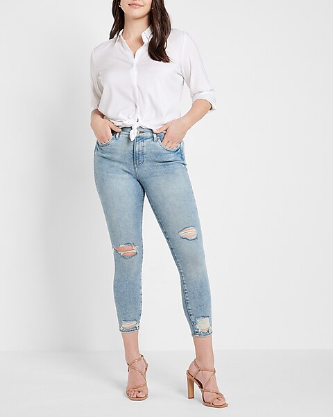 Mid Rise Light Wash Ripped Cropped Skinny Jeans