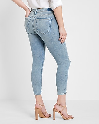 Mid Rise Light Wash Ripped Cropped Skinny Jeans