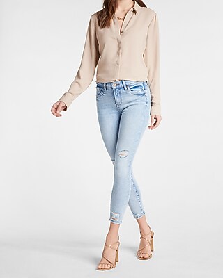 Mid Rise Light Wash Ripped Cropped Skinny Jeans