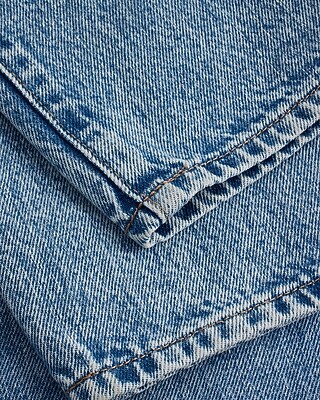 Mid Rise Medium Wash Distressed Boyfriend Jeans